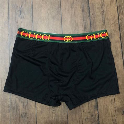 cueca gucci preta antigas